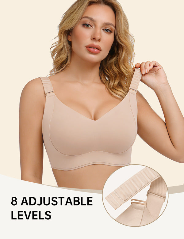 Beige T-shirt bra with V-neck cups and adjustable strap, model holding strap