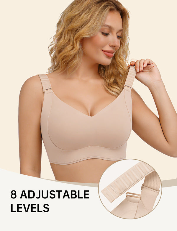 Beige T-shirt bra with V-neck cups and adjustable strap, model turning to side